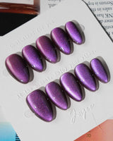 Grape Color Cat-eye press-on nails in extra short almond shape — purple cat eye nails