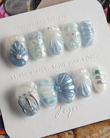 Great Barrier Blue jellyfish-dream nails with gradient blues and delicate 3D accents