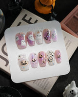 Hallow’s Eve handmade press-on nails in short coffin shape by Joyee Nails