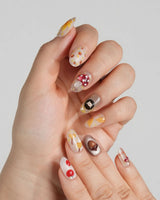 Cute Hedgehog press-on nails with forest mushrooms, bows, plaid, and autumn leaf accents