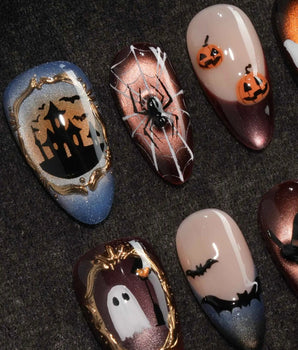 Haunted Manor press on nails with a haunted house in a gold frame, a 3D spider on a web, ghost, witch hat and black cat on cat eye - image 1