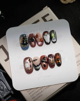 Haunted Manor handmade press-on nails in short oval shape by Joyee Nails