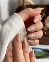 Haze Bloom press-on nails — Elegant Nude Pink, Embossed Florals & French Gold Edging. handmade nail art by Joyee Nails