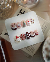 Holiday Party press-on nails in extra short squoval shape — pearl nude cat eye snowflake bow silver glitter soft sheen