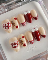Holy night press-on nails in extra short almond shape — Festive Christmas, Gingerbread Man & Hearts.