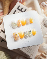 Iced Punch cocktail press-on nails in extra short oval shape