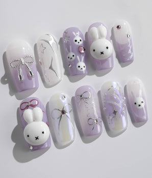 Icy Miffy-Purple press-on nails in medium square shape — Dreamy Purple, 3D Bunny & Silver Wire Bows.