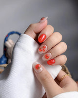 Icy Tomato handmade garden nail set with glossy tomato details and crystal-clear base