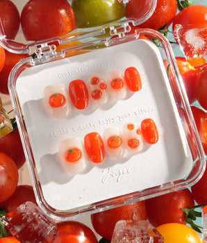 Icy Tomato handmade press-on nails featuring Clear & Orange-Red, 3D Tomatoes & Dewdrops.