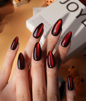 Inferno spotlight cat eye press on nails, near-black red with a long bright red magnetic glow - image 1
