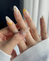 BeeBee Nails nail art close-up showing Daisy & Bee, Yellow French. details
