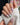 Joyeenails handmade press-on nail set with soft pink tones and floral art