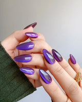 Grape Color Cat-eye nail art close-up showing purple cat eye nails details