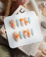 Juicy Summer orange citrus press-on nails in short almond shape