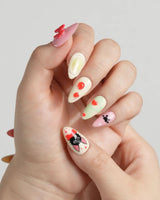 Kiki’s Enchanted Picnic press-on nails — Pastel Multicolor, Hand-painted Cat & Bow. handmade nail art by Joyee Nails