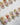 Kiln Spring handmade press-on nails featuring Colorful Butterflies, Hand-painted Golden Outlines & Glitter Petals.
