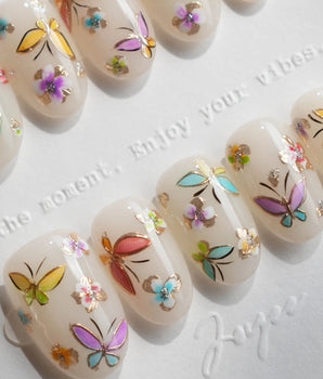 Kiln Spring handmade press-on nails featuring Colorful Butterflies, Hand-painted Golden Outlines & Glitter Petals.
