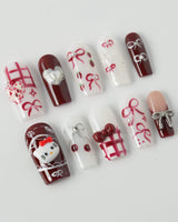 KT Cake press-on nails in medium square with sweet cake details and polished finish