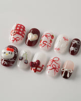 KT Cake press-on nails in short oval with playful dessert art and soft glossy color