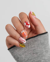 Kusama Dot custom-size short oval press-on nails with bright polka dot art