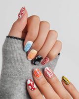 Kusama Dot short oval press-on nails with maximalist multicolor dot patterns