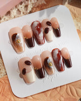 Latte Coffee press-on nails with rich brown marble, caramel coffee tones and 3D gel details
