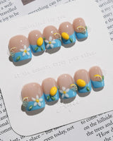 Lemon Grove press-on nails in extra short square shape — Blue French, 3D Lemon & Florals.