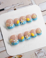 Lemon Grove press-on nails in extra short squoval shape — Blue French, 3D Lemon & Florals.