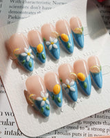 Lemon Grove press-on nails in medium stiletto shape — Blue French, 3D Lemon & Florals.