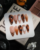 Leopard Boo handmade press-on nails in medium stiletto shape by Joyee Nails