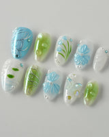 Lotus Breeze press-on nails in extra short almond shape — Pearly and 3D Sculpted Florals
