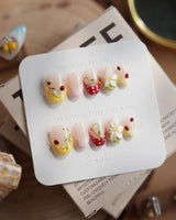Lucky Dot press-on nails in extra short oval shape — Cute Pastoral, Hand-painted Ladybugs & Red Polka Dot French Tips.