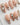 Baroque pearl press on nails with molten gold and real pearls on a nude base