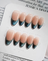 Malta Blue close-up of midnight blue French manicure with luminous cat-eye depth