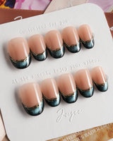 Malta Blue glossy almond nails with deep blue cat-eye shimmer and clean gold border