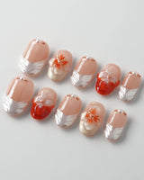 Duchess Marigold reusable press-ons with modern orange flower nail art