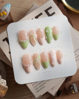 Matcha Ribbon nail art close-up showing Fresh Jelly Green, 3D Bows & French Pearl Outlines. details