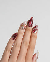 Ruby Night press-on nails in medium almond shape — Glitzy Red & Gold Christmas, 3D Cat-eye Swirls & Glitter Christmas Trees.