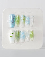 Lotus Breeze press-on nails in medium coffin shape — Pearly and 3D Sculpted Florals