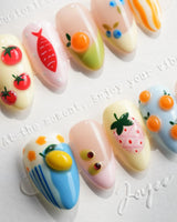 Mercato extra short almond nails with 3D tomatoes, citrus, fish, berries, and flowers