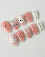 Miffy Sweetie press-on nails in extra short almond shape — Sweet Pink-Orange, 3D Bunny & Silver Bows.