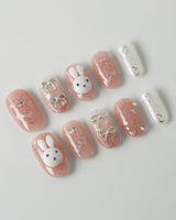Miffy Sweetie press-on nails in short oval shape — Sweet Pink-Orange, 3D Bunny & Silver Bows.