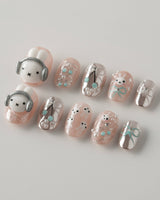 Miffy's Vacay extra short oval nails with 3D rabbit accent and silver chrome