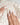 Minimalist nude Christmas nails with glossy cat-eye finish