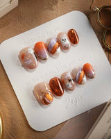 Mischief Maker nails — nude base orange gradient by Joyee Nails