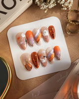 Mischief Maker nails — nude base orange gradient by Joyee Nails