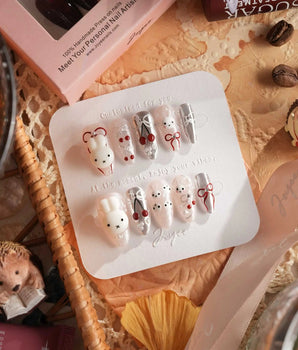Miss Miffy handmade press-on nails featuring nude base Silver Metallic, 3D Rabbit & Cherry.