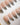 Modern silver French tips with bow accents