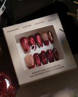 Molten Rouge medium coffin press-on nails with red cat-eye, gold outlines and crystals