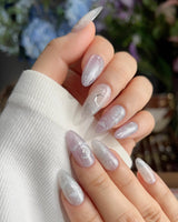 Moonrest medium almond nails with soft moonlit ombre and fine silver glitter